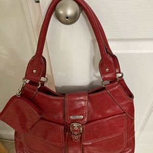 Franco Sarto Red Handbag change purse included. Zipper exterior,